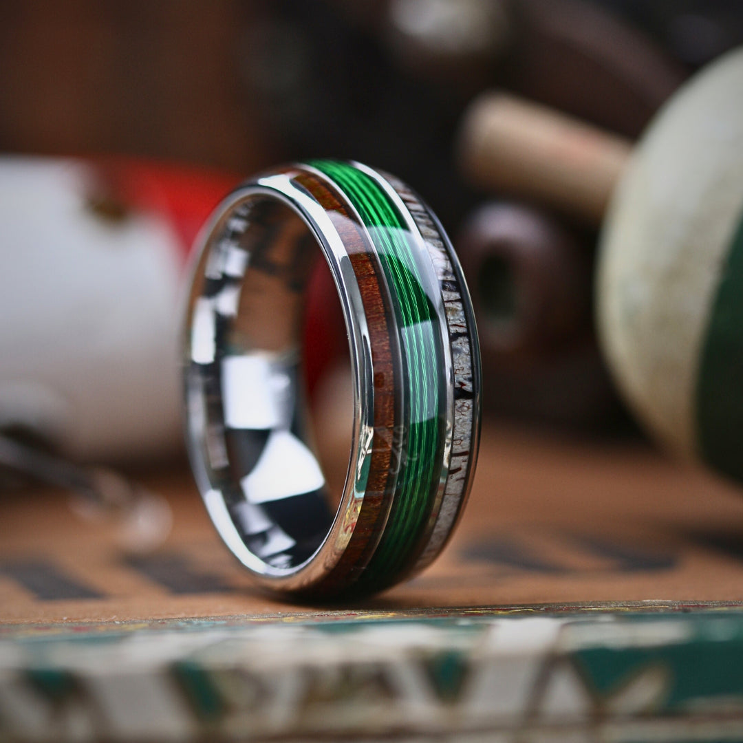 Men's Green Fishing Line Ring Crafted out of Antler, wood, and fishing line.
